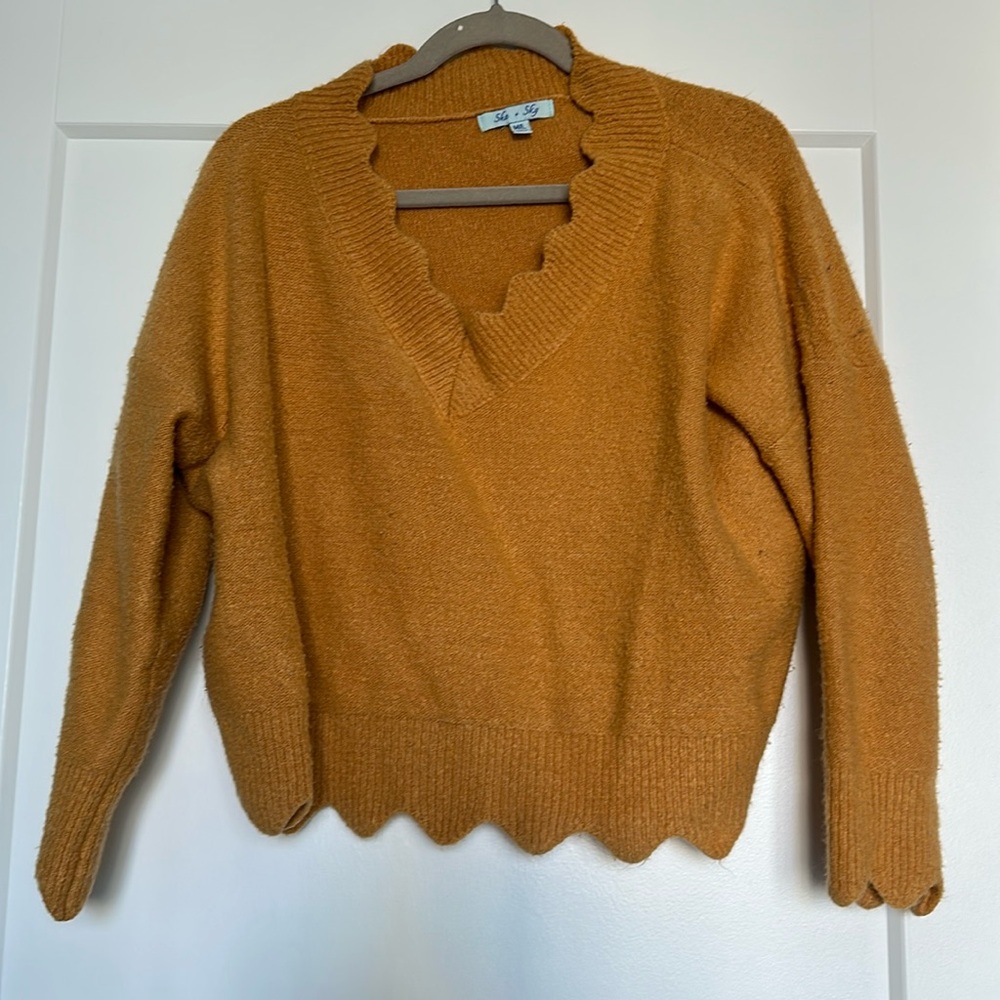 Orange scallop sweater
